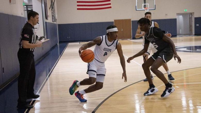 Penn State DuBois basketball player Jadon Myers starts his drive to the basket during a game at the PAW Center.