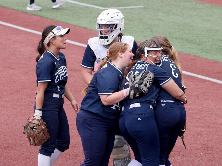 Members of the Penn State DuBois softball team celebrate an extra innings win over Lyon College during the 2024 USCAA Small College World Series.